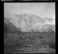 A snow-covered mountain near Scotty's Springs and Division Creek, Independence vicinity, 1916