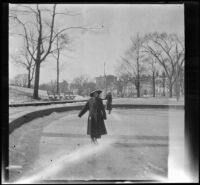 Woman ice skates on a frozen pond, Boston, 1914
