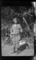 Mertie West poses with a fishing rod, Redlands vicinity, about 1927