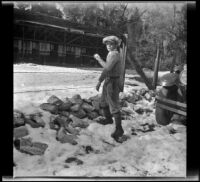 H. H. West, Jr. gets ready to throw a snowball, Redlands vicinity, about 1930
