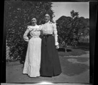 Mertie Whitaker and Lelia Gillan pose with their arms around each other, Fresno, 1901