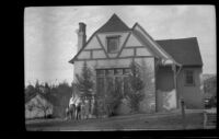 Richard Siemsen, Alfred Siemsen, H. H. West Jr., Dorothea Siemsen, Elizabeth West Siemsen, and Mertie West stand in front of the Siemsen's home, Glendale, about 1937