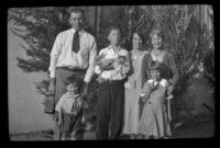 Alfred Siemsen, Richard Siemsen, H. H. West Jr., Elizabeth West Siemsen, Mertie West, and Dorothea Siemsen stand in front of the Siemsen's home, Glendale, about 1929