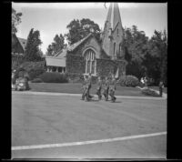 H. H. West Jr. and other R. O. T. C. cadets march in front of Little Church of the Flowers in Forest Lawn Cemetery, Glendale, 1936