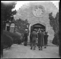 Guests walk into the Wee Kirk o' the Heather for the wedding of Sam Longstreet and Cosette Pohle, Glendale, 1939
