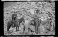 Cleo Swain and Glen Velzy on horseback on the trail at the summtit of Kersearge Pass, 1919