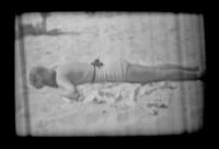 Jane Deming sunbathing, Hermosa Beach, 1937