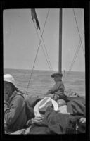 Wilfrid Cline and Elizabeth West pose on a bait boat, Hermosa Beach, about 1920