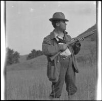 Charles Davis of Indianapolis poses with a 12-gauge gun, Acton, about 1906