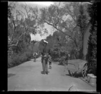 A guard patrols the park, Long Beach, 1933