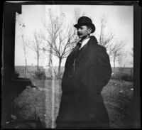 Will Mead poses at the Mead farm in winter, Red Oak, about 1902