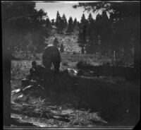 Al Schmitz reclining in camp at Hessian Meadows, Olancha vicinity, 1914