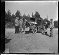Mary West, Ray Schmitz, Elizabeth West, Frances West and Al Schmitz gather around the Velzy's Buick, Mendocino County vicinity, 1915