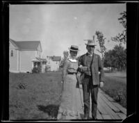 H. H. West walks with arm in arm with his cousin, Cora Lemberger Gordon, Ottumwa, 1900