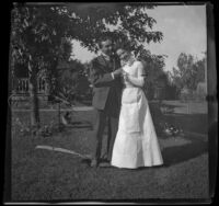 H. H. West stands with his arm around Ellen Lorene (Pinkie) Lemberger, Ottumwa, 1900