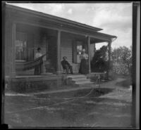 Lavinia Jones, William H. Jones and Zella Jones and her parents on their front porch, Red Bluff, 1898