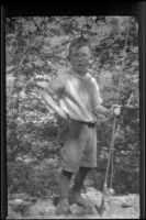 H. H. West, Jr. posing with a fishing rod, Carpinteria vicinity, about 1924