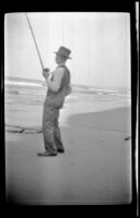 Abraham Whitaker surf fishing near Rincon Point, Carpinteria vicinity, about 1924