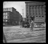 Fallen horse pulling a cart on Market Street, San Francisco, 1900