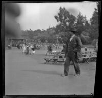Man walks by the children's section of Golden Gate Park, San Francisco, 1900