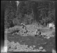 Wilhelmina West and Mary West at the edge of Cow Creek, Burney vicinity, 1915