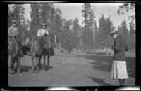 One of John Bidwell's daughters taking a picture of Wilfrid Cline, Jr. and John Bidwell's neighbor, Burney Falls vicinity, 1917