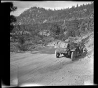 H. H. West's Buick parked alongside the road en route to Lake Tahoe, Truckee vicinity, 1917