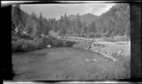 View of a bridge crossing the Truckee River somewhere between Truckee and Lake Tahoe, Truckee vicinity, 1917