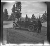 H. H. West's Buick parked alonside the road, Cisco, 1917
