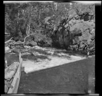 Stream spilling over a weir, June Lake vicinity, 1914