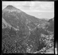 Albert Schmitz hiking the trail along Agnew Lake, June Lake vicinity, 1914