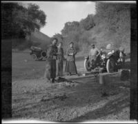 Nella West, Mary A. West, Isabelle Smith and Dave Smith standing in their campsite at the foot of the Jolon grade, Monterey County, 1913