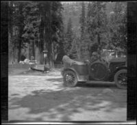 H. H. West's Buick parked by a water trough, Eldorado National Forest, [1913]
