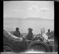 Nella A. West, Mary A. West and Isabelle Smith stopping to look across Lake Tahoe, Lake Tahoe, 1913