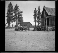H. H. West's Buick and Dave F. Smith's EMF parked in front of the Mono Mills general store, Mono Lake, 1913