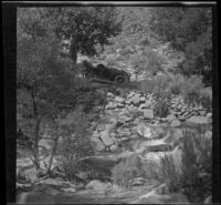 H. H. West's Buick parked on an incline near Cottonwood Creek, Inyo County, 1913