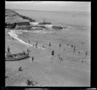 Beach at La Jolla with a boat on the sand, San Diego, 1909