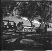 Bessie Velzy has a picnic with Mary West and West's daughters, Elizabeth and Frances, Lake Elsinore, 1909