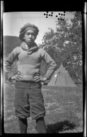 Keyo posing in front of the miner's tent, San Francisquito Canyon, about 1923