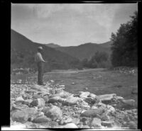 Will P. Mead fishes from the right bank of the San Gabriel River, San Gabriel Canyon, about 1903