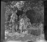 Glen Velzy, Frances West, Elizabeth West, Mary A. West and Bessie Velzy gathered in their campsite, San Gabriel Canyon, about 1915