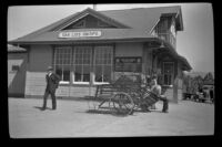 Southern Pacific Railroad depot with men in front, San Luis Obispo, 1942