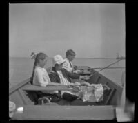 Frances West, Elizabeth West, and Wilfrid Cline on a boat, San Pedro, about 1910