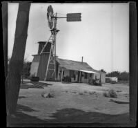 Nichols Ranch house and windmill, viewed at an angle, Santa Ana, about 1899