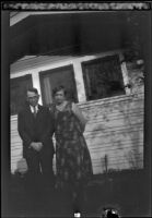 Wayne West and his wife, Maud Foreman West, pose in front of their house, Santa Ana, about 1932