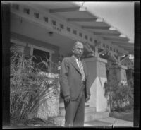 Wilson West stands in front of Wayne West's home, Santa Ana, 1933