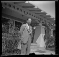 Wayne West stands in front of his home, Santa Ana, 1933