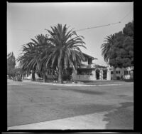 Wayne West's home with three large palm trees next to it, Santa Ana, 1942
