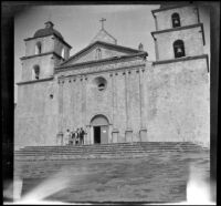 Wilhelmina, Frances, Elizabeth, and Mary West and William "Babe" Bystle stand on the steps of the Santa Barbara Mission, Santa Barbara, 1915