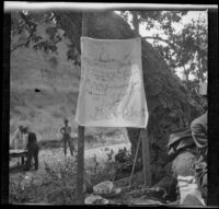 Handwritten Prestolite ad posted at the Rubber Men's picnic, Santa Monica Canyon, about 1908
